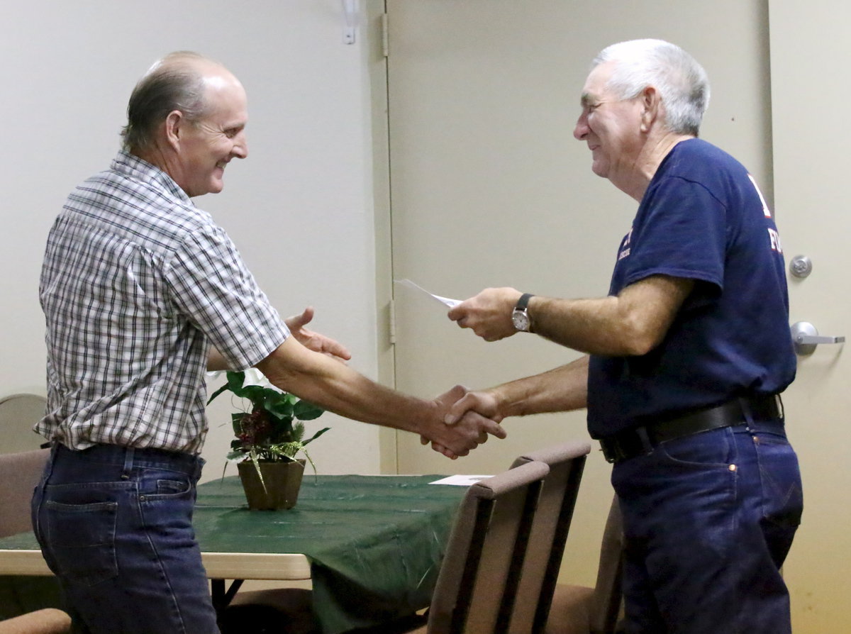Image: Assistant Chief Randy Boyd accepts his service certificate from Chief Donald Chambers. Randy has 28 years of service with the department.