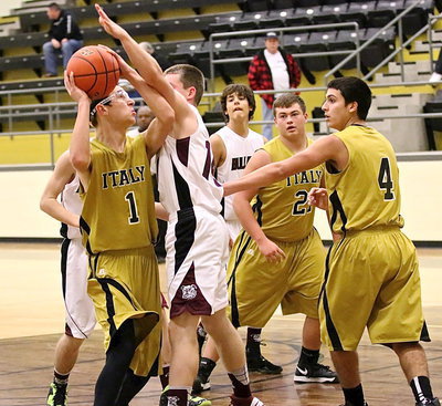 Image: Gladiator Ryan Connor(1) sticks with it until he scores.