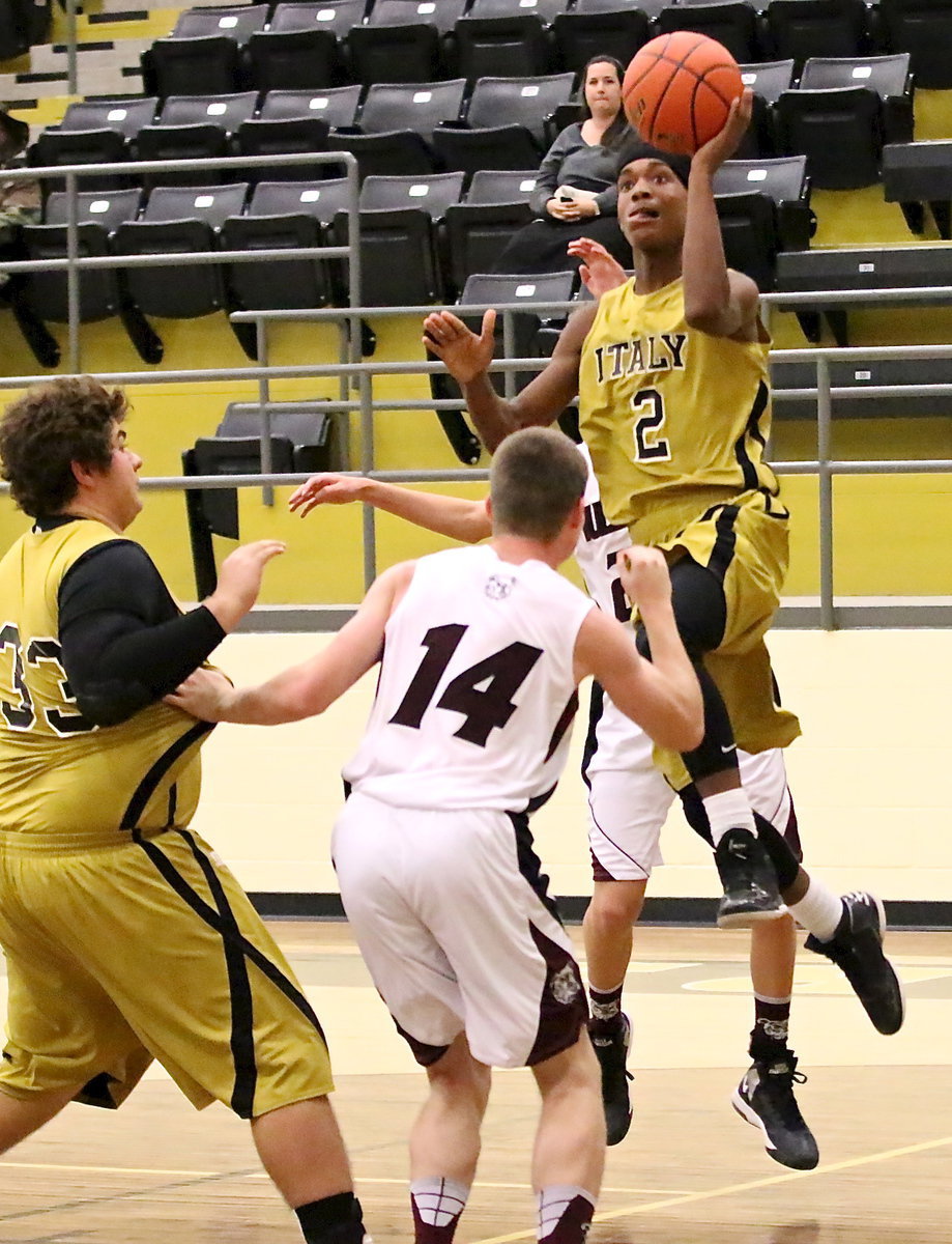 Image: Trevon Robertson(2) scores from the baseline. Robertson scored a career high 32-points in Italy’s tournament win over Bynum.