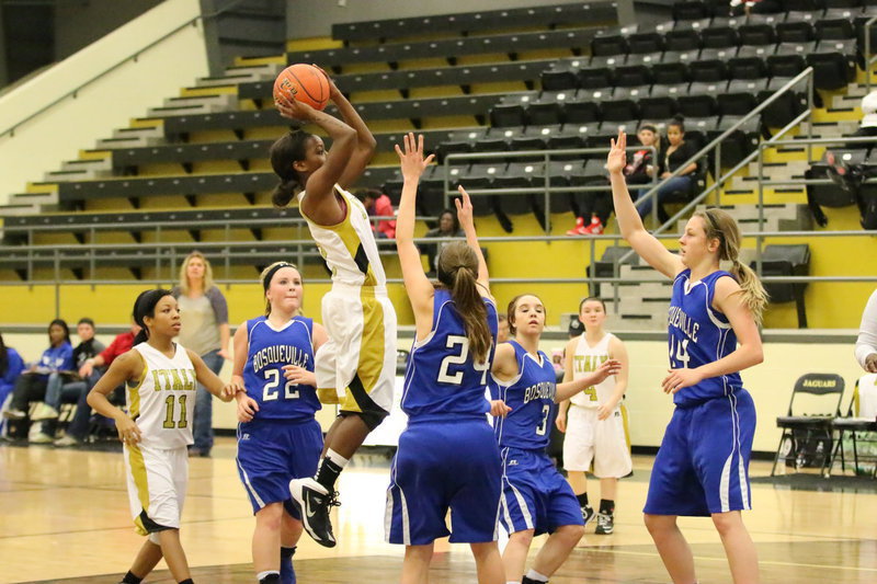 Image: Kortnei Johnson(3) puts in a jumper.