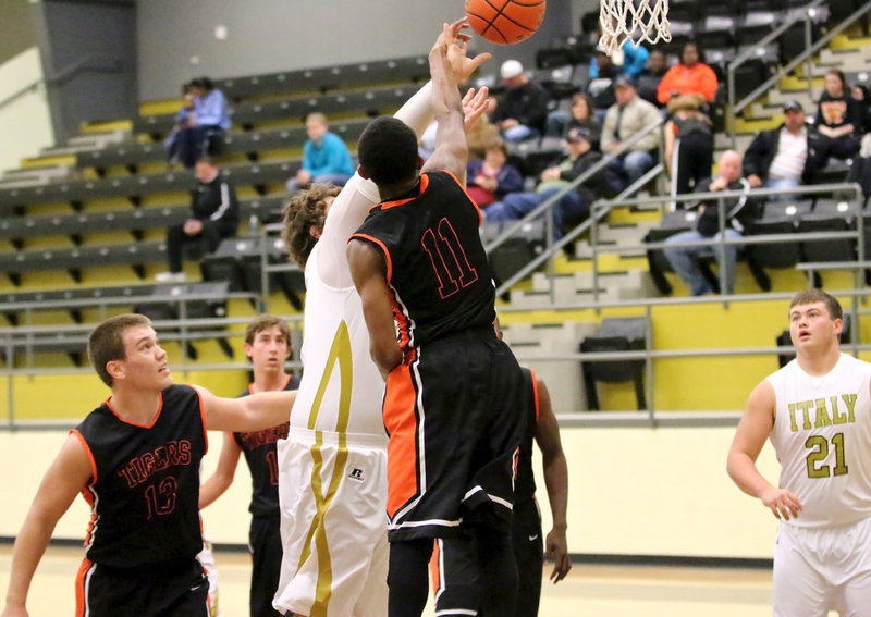 Image: Kevin Roldan(33) draws a shooting foul.