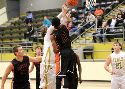 Image: Kevin Roldan(33) draws a shooting foul.