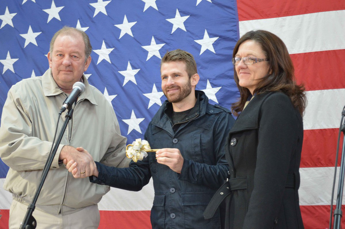 Image: Mayor Hobbs honoring the Veteran Navy Seal, Mr. Parrott, with a Key to our City