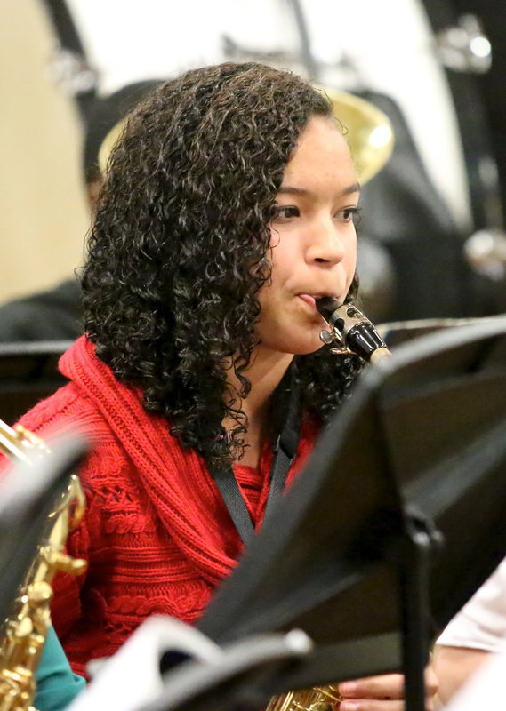 Image: April Lusk makes angelic music with her saxophone.