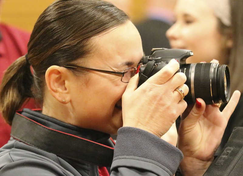 Image: Andrea Hooker takes pics of her kiddos during and after the band concerts.