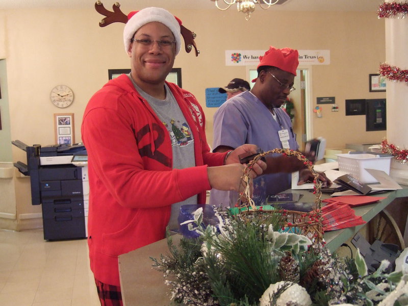 Image: Chris Baker (administrator) getting ready for the big Christmas Party.