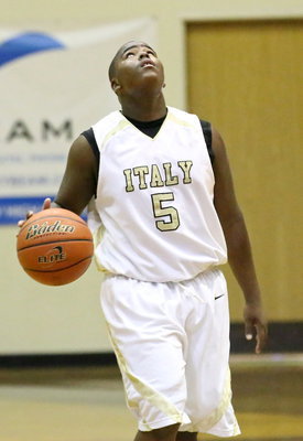 Image: Kenneth Norwood(5) checks the clock in hopes of pulling off a comeback against Blooming Grove.
