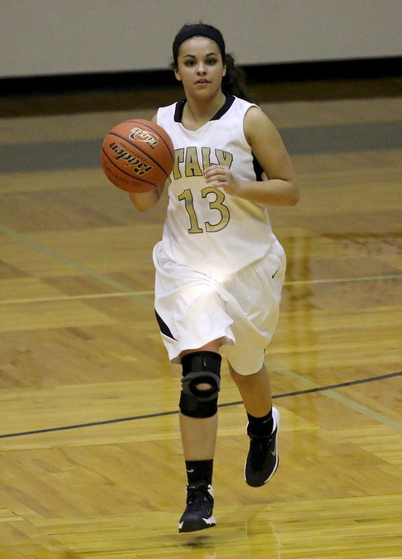 Image: Italy’s Ashlyn Jacinto(13) brings the ball up the court.