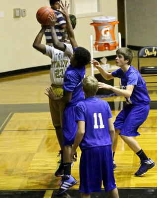 Image: Anthony Lusk, Jr.(23) powers up towards the hoop.