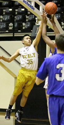 Image: Jonathan Salas(35) blocks a shot attempt from Rice.
