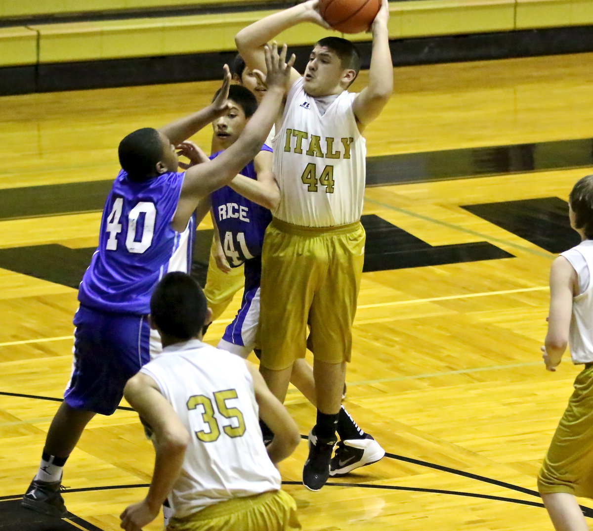 Image: Alex Garcia(44) rises to take the jumper.