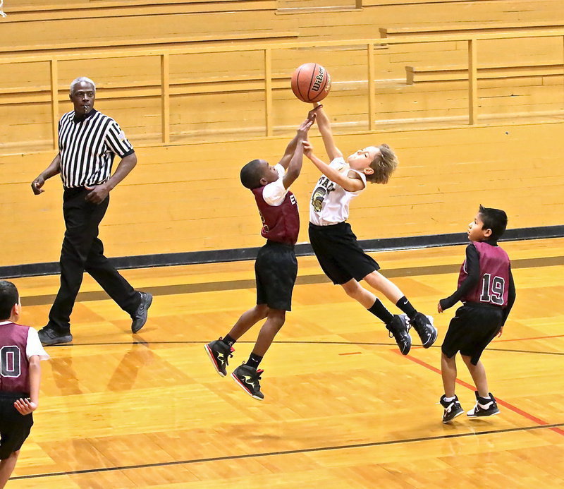 Image: Leaning in to fire up a jumper is Italy’s Chase Hyles(11).