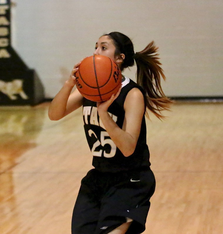 Image: Italy’s Lizzy Garcia(25) pulls up for a jumper.