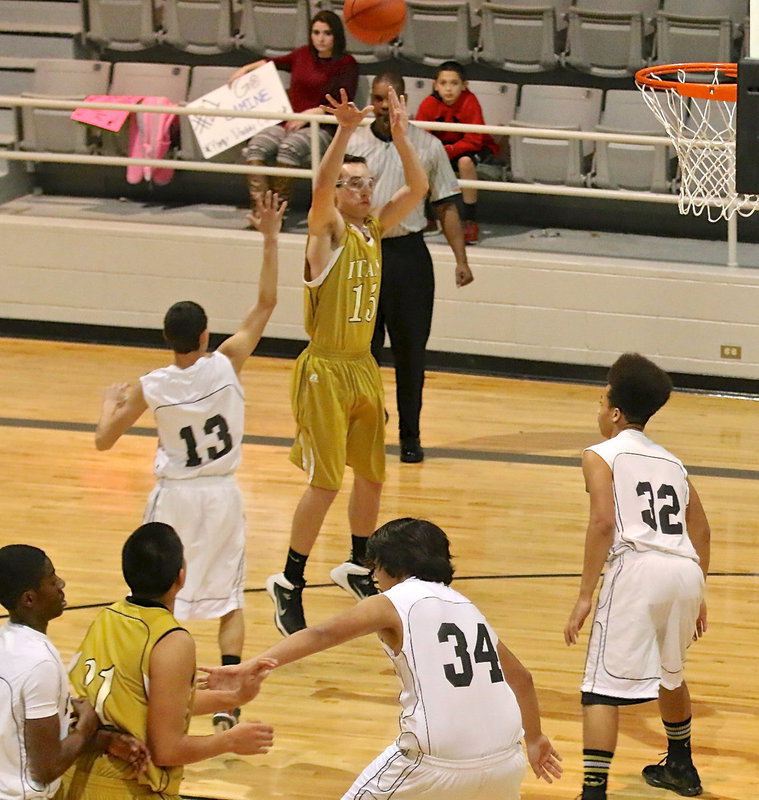 Image: Ryan Connor(15) shoots from the wing for Italy.