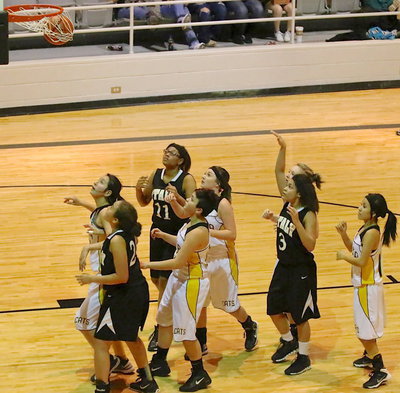 Image: Alex Minton(3) drops in a shot from the lane.