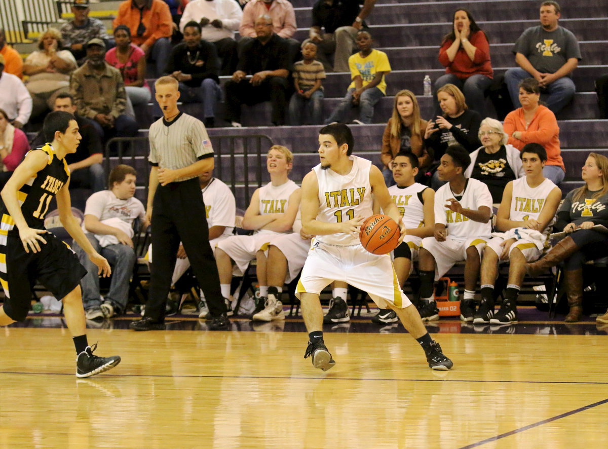 Image: Tyler Anderson(11) tries to run out the clock with the Gladiators in the lead.