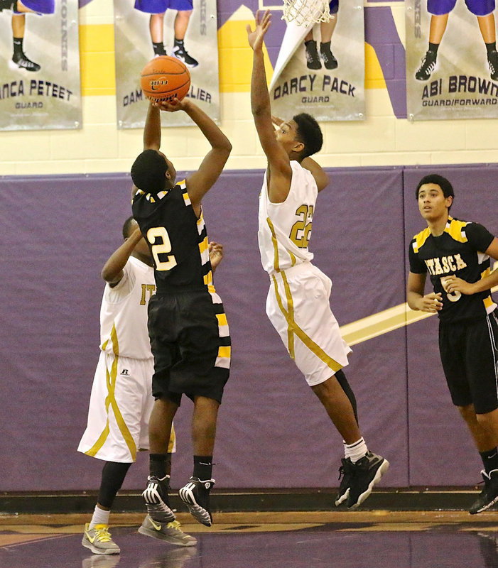 Image: Tre Robertson(22) was everywhere defensively for the Gladiators as he up to block a shot.