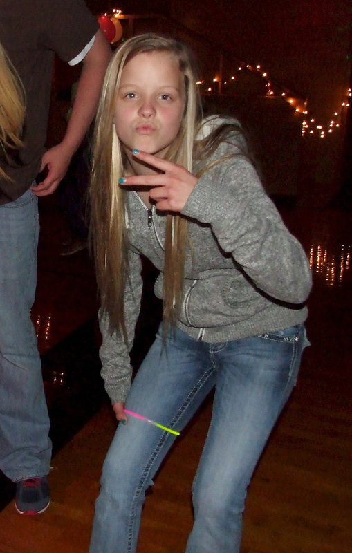 Image: Alex Jones has a glow necklace around her pants and is ready to dance!