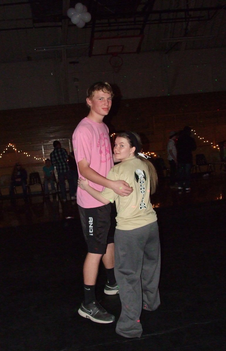 Image: Cody Boyd dances with himself, oh wait, there she is! Cody Boyd dances with Tara Wallis. Some things just make sense.