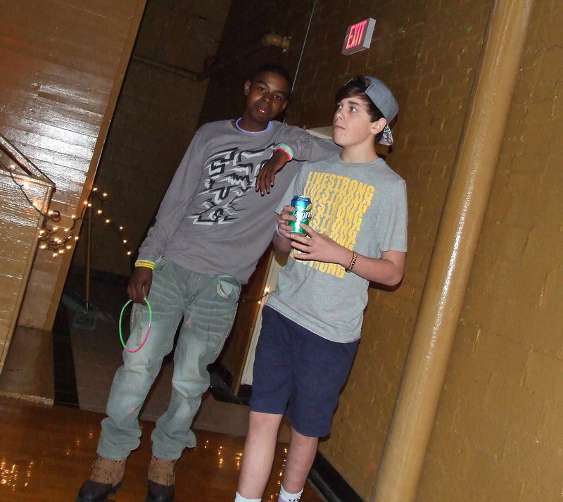 Image: Byron Lusk, Jr., and Josh Telatnyk make their grand entrance back into the dance.