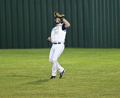 Image: Italy’s Kyle Fortenberry(14) makes catching a fly ball look easy in right field.