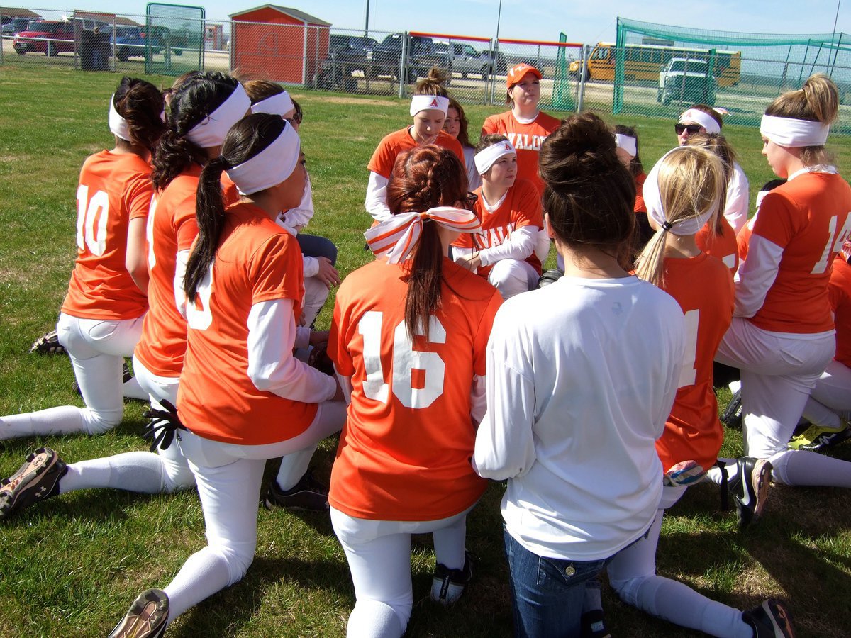 Image: The Avalon softball team is in their huddle!