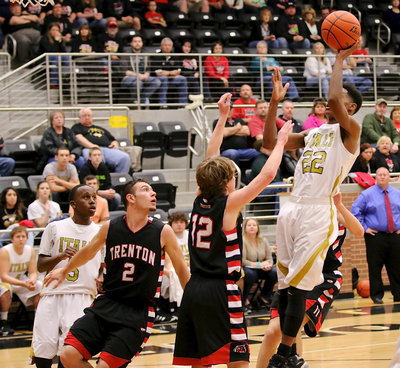 Image: Gladiator Trevon Robertson(22) pulls up to shoot a mini jumper in the lane.