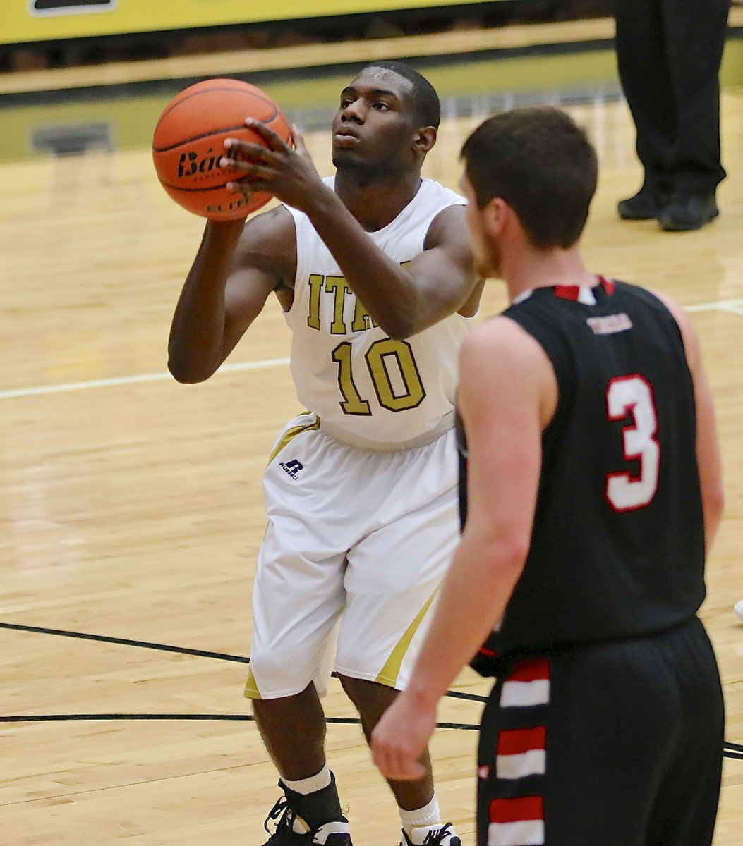 Image: TaMarcus Sheppard(10) shoots free-throws in the second-half against Trenton.