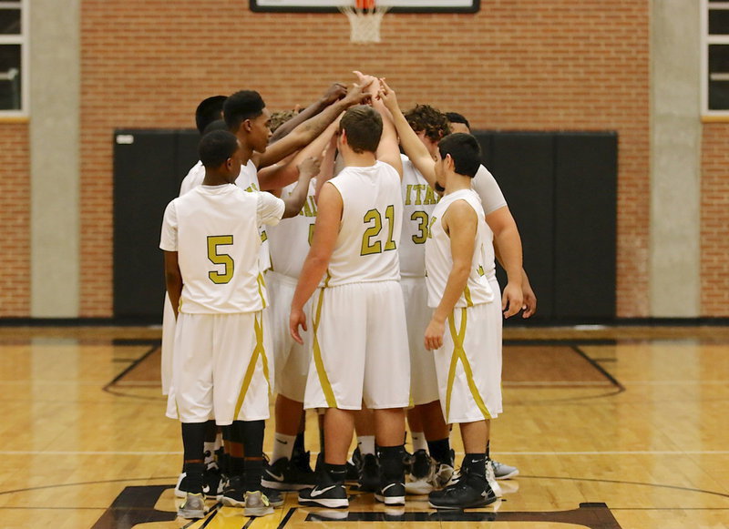 Image: The Gladiators huddle before taking on the Trenton Tigers for the Area championship.
