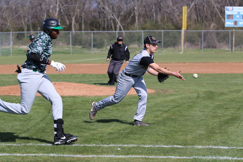 Image: Pitcher Ryan Connor(4) fields a grounder and then tosses the ball to first-base for an out against Kerens.
