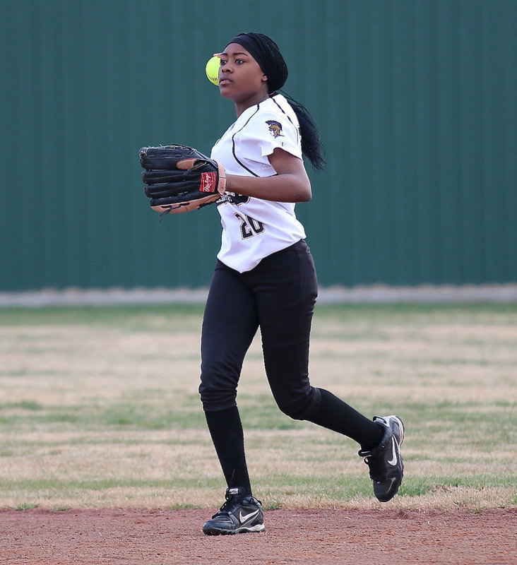 Image: Second-baseman, K’Breona Davis(20) as cutoff for the Lady Gladiators.