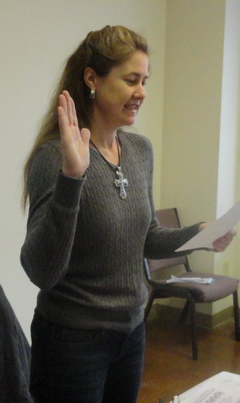 Image: Ronda Cockerham administers the Oath of Office to newly-appointed members of the Community Activities Committee.