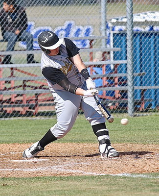 Image: John “Bat Bender” Byers(18) warps another bat.