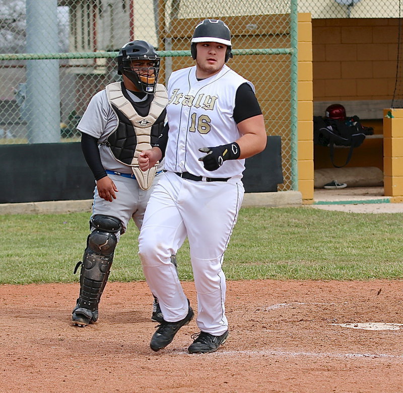 Image: Kevin Roldan(16) crosses home plate for the Gladiators.