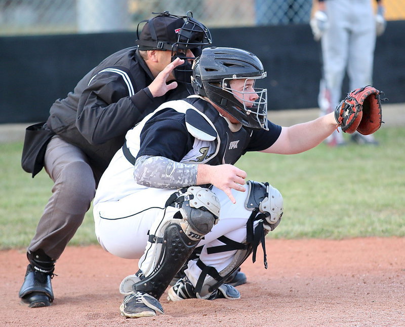 Image: Catcher Tyler Vencill(15) awaits the upcoming pitch.