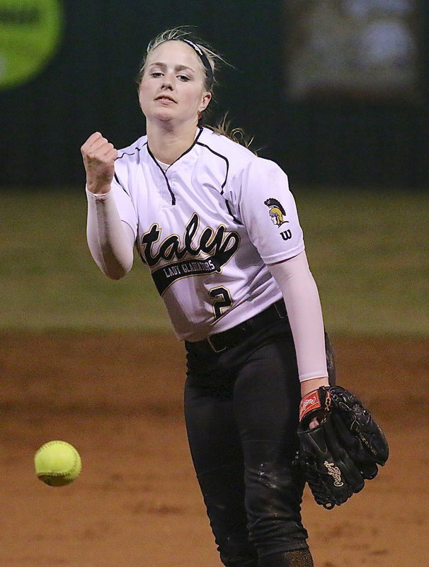 Image: Junior Madison Washington(2) tries to deliver a punch to the Panther hitters.