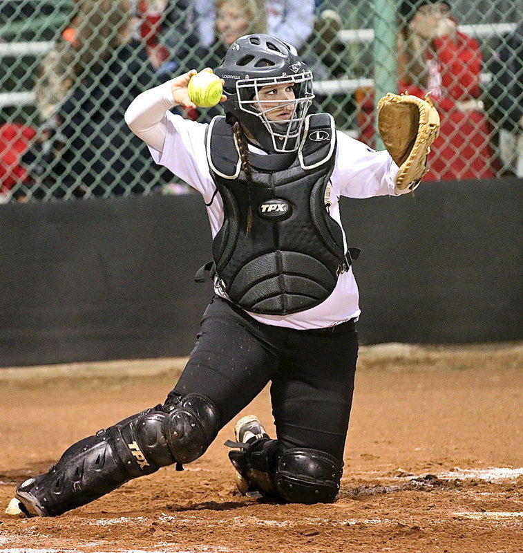 Image: Lady Gladiator catcher Paige Westbrook(10) surveys the bases.