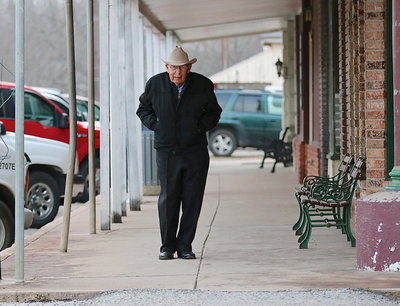 Image: Ellis county’s own Horace Bratcher takes time out from the Italy Opry to sample a dessert during the Spaghetti Dinner.
