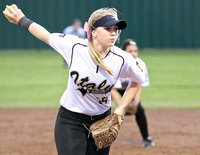 Image: Jaclynn Lewis(15) keeps the pressure on from the hill.