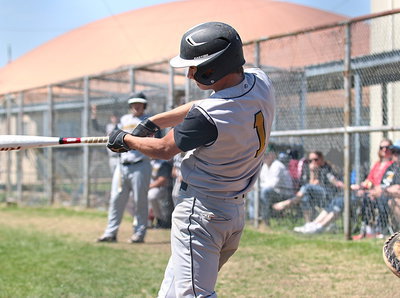 Image: Italy sophomore Levi McBride(1) launches a ball well over the right field fence for an out-of-the-park home run.