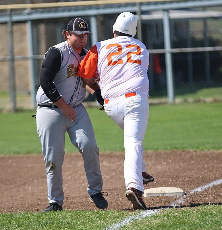 Image: Gladiator first-baseman Kevin Roldan(16) tags out an Eagle runner.