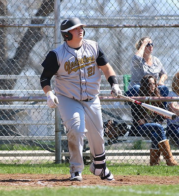 Image: It’s going, it’s going….not quite. John Byers(21) just misses going yard when the ball drops down at the base of the centerfield fence for a double.