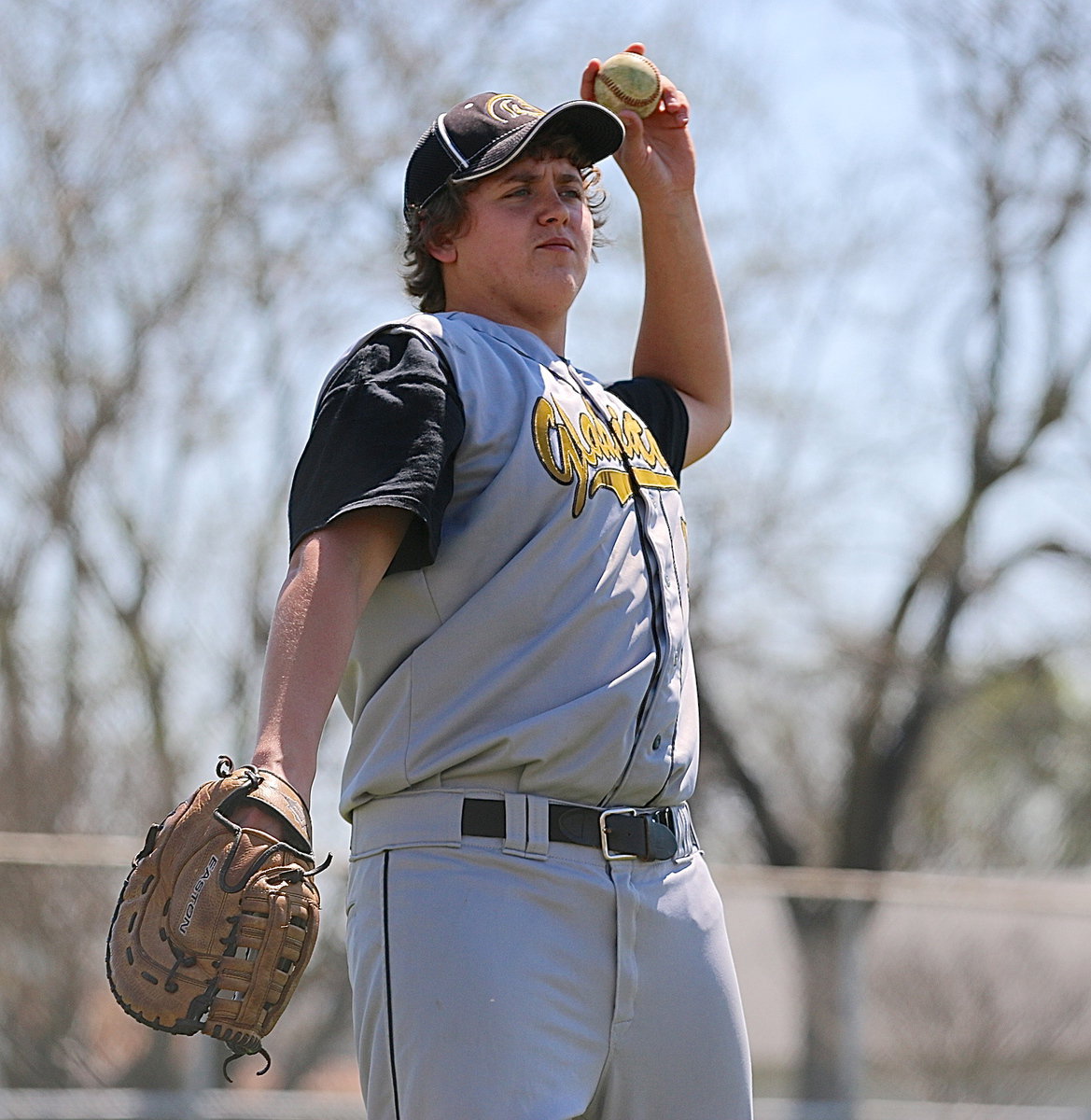 Image: Senior first-baseman Bailey Walton stands triumphant as the Gladiators improve to 2-0 in district play.