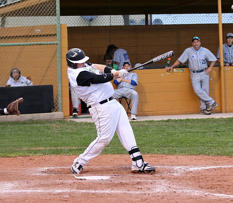 Image: Italy’s John Byers(18) tries to make a play with a fly ball into centerfield but the Bulldogs make the catch.