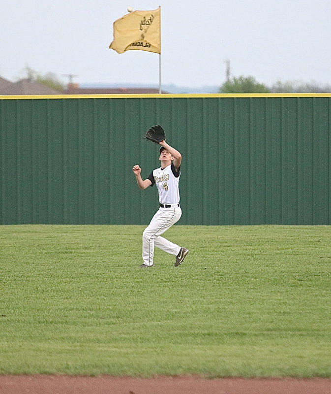 Image: Italy right fielder Ryan Connor(4) gets under a fly ball hit to the gap.
