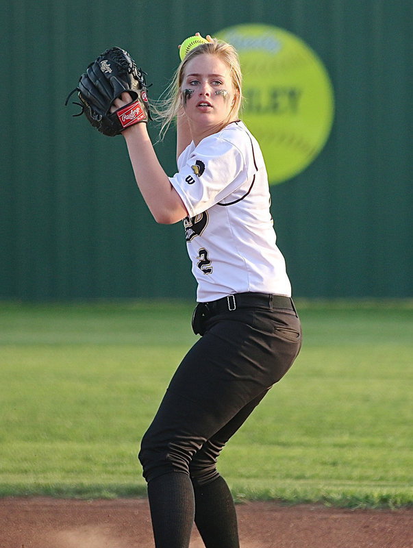 Image: Madison Washington(2) checks the base runners.
