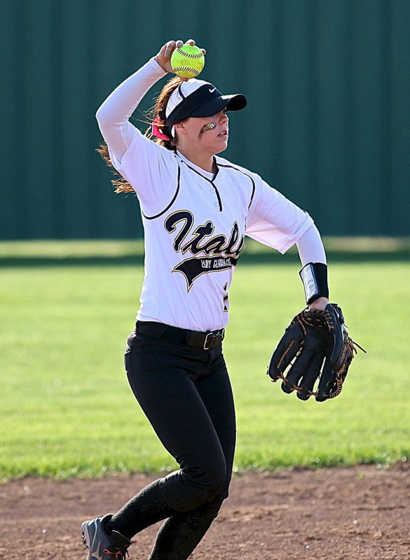 Image: Bailey Eubank(1) brings the ball up to the pitcher’s circle to start an inning.