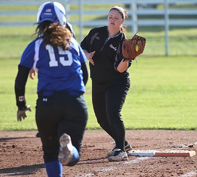 Image: Paige Westbrook(10) makes the catch for another out at first-base.