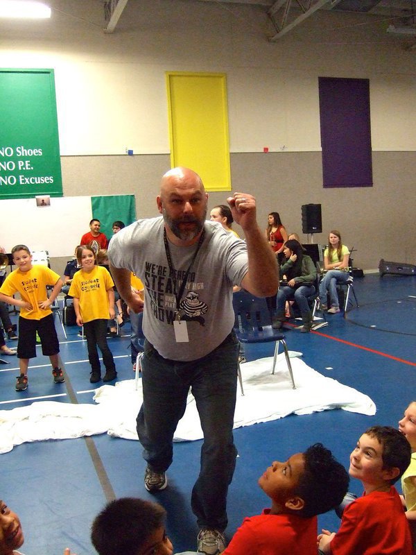 Image: Mr. Joffre daring the students to throw a pie in his face!