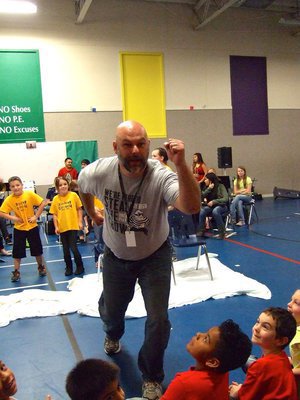 Image: Mr. Joffre daring the students to throw a pie in his face!
